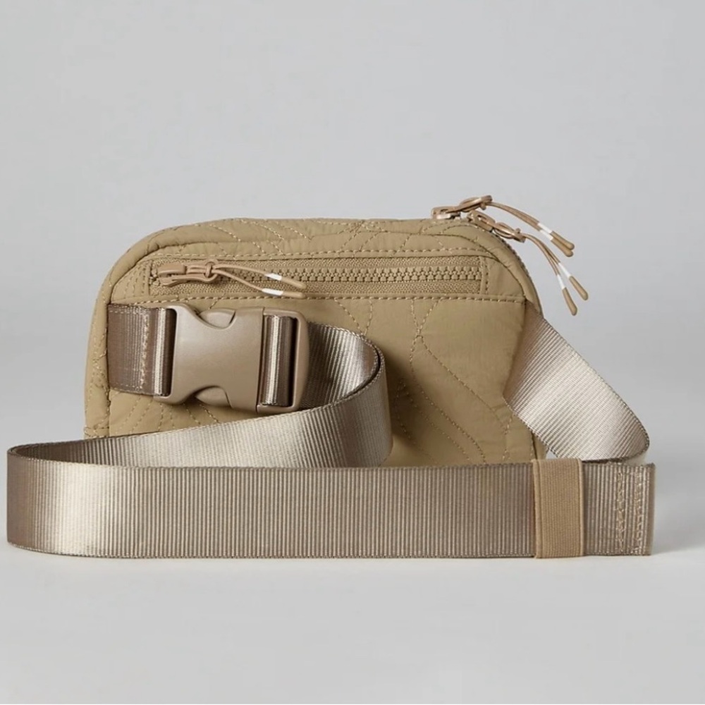 Fabletics, the loft belt bag “ fanny pack” in. A Tan color NEW